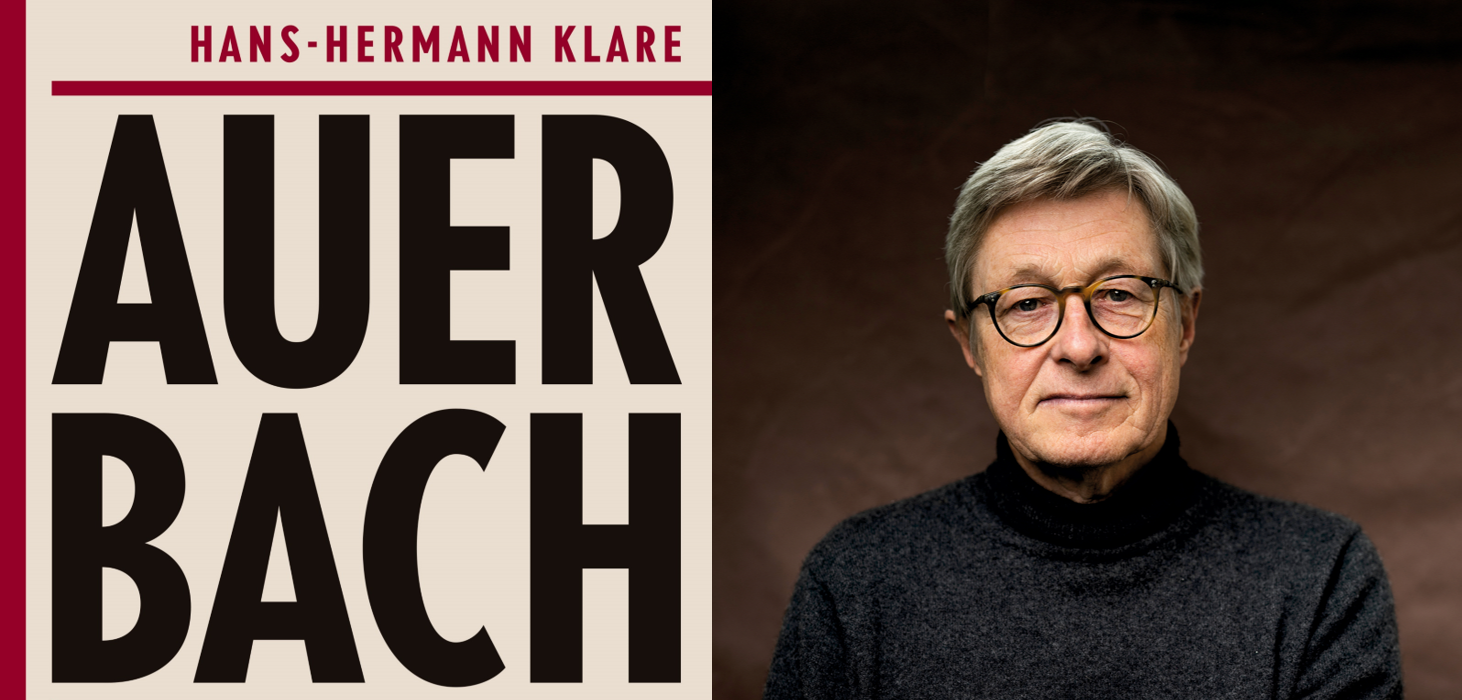 Hans-Hermann Klare im frontalen Profil: zu sehen ist ein älterer Mann mit grauem Haar, gräulich-blauen Augen und einem freundlichen Gesicht. Er trägt eine runde Hornbrille und einen grauen Rollkragenpullover.