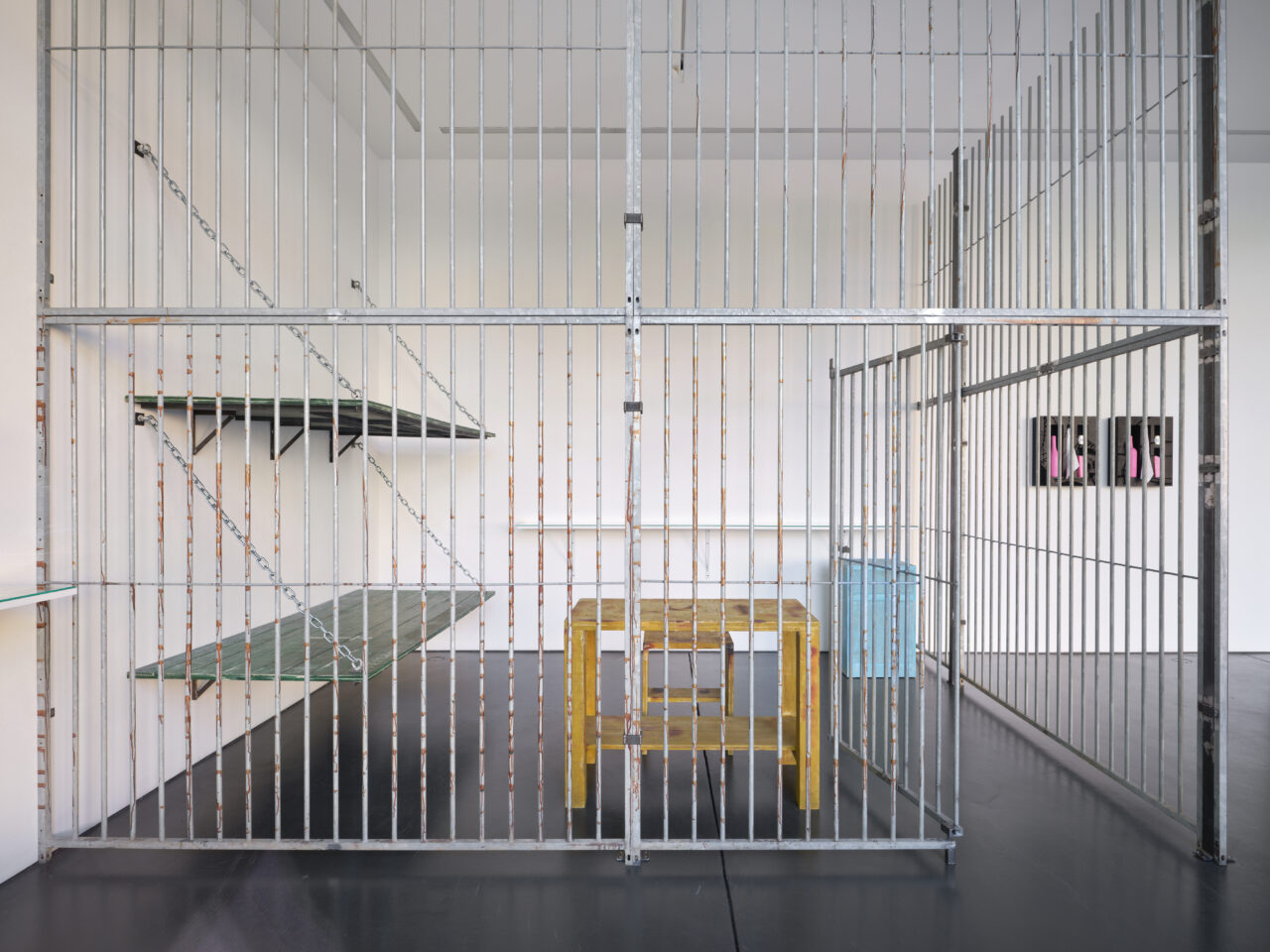 a prison cell inside a gallery
